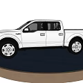 Shiny Silver Four Door Pickup Truck On Circular Display Platform With Black Background