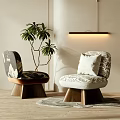 Stylish Patterned Single Sofa With Wooden Legs White Cushion Green Plant And Rug