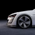 White Modern Hatchback Car With Sleek Lines Black Alloy Wheels And Red Front Accents