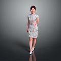 Woman Wearing Traditional Chinese Qipao with Floral Patterns Standing Gracefully