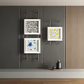 Three Abstract Paintings Hanging On Gray Wall With Metal Hooks 3d model