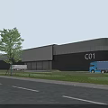 Modern Industrial Warehouse Labeled C01 With Trucks On Road And Trees By Lawn