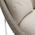 Modern Wicker Leisure Chair With Beige Cushions And Silver Metal Legs