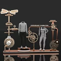 Elegant Anniversary Celebration Window Display with Sportswear Mannequins and Mechanical Gears
