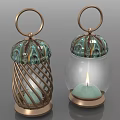 Two Decorative Lanterns Featuring Brass Frame Glass Body And Green Candle