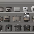 Modern Stylish Rice Cookers And Pressure Cookers As Kitchen Appliances On Shelves