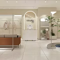 Modern Minimalist Clothing Store Interior With Mannequins Dresses Plants And Decorative Items