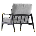 Modern Single Sofa With Light Gray Upholstery Black Frame Gold Accents And Green Cushion