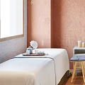 Tranquil SPA Room Interior Featuring Two Massage Beds White Sheets Round Mirror And Wooden Flooring
