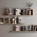 Modern Wooden Wall Cabinets With Books Decorative Sculptures And Plants On Light Gray Wall