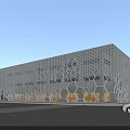Modern Office Building With Honeycomb Patterned Metal Facade Glass Windows And Urban Street View