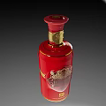 Luxury Red Wine Bottle and Glass with Gold Decorations and Traditional Label Design
