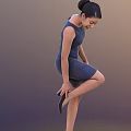 A Woman in Blue Dress Lifting One Leg and Adjusting Shoe Against Dark Blue Background