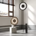 Modern Floor Lamps With Circular Design White Base And Black Stand In Bright Interior
