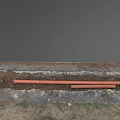 Excavated Road Facilities With Traffic Cones Brown Pipes And Concrete Structures