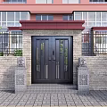 Black Double Door Entrance Gate With Stone Pillars Spherical Decorations Brick Wall And Red Building