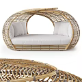 Woven Rattan Curved Outdoor Sofa With White Cushions And Hollow Design