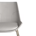 Modern Gray Leather Dining Chair With Curved Back And Gold Metal Legs