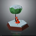 Red Fox Sitting Under Snowy Tree With Falling Snowflakes And Green Grass