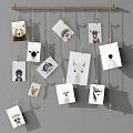 Creative Photo Wall With Family Photos And Art Prints Hanging On Strings