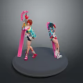 Two Female Characters In Colorful Outfits With Pink Skis Standing On Gray Round Base