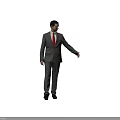 A Man In Gray Suit With Red Tie Standing Against Light Background
