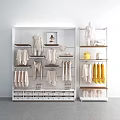 Retail Display Shelves With Mannequins Hanging Clothes Yellow Garments And Storage Drawers