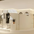 Modern Minimalist Clothing Store Interior With Hanging Clothes Green Plants And Bright Lighting