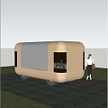 Modern Mobile Kiosk With Open Roof Glass Walls And Pedestrian Near Grassy Area