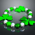 Elegant Green Clover Charm Bracelet With Green And Silver Beads Design