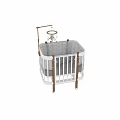 White Frame Baby Crib With Wooden Posts Gray Mattress And Hanging Mobile