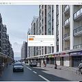 Vibrant Commercial Street In Urban Area With Tall Buildings Shops Pedestrians And Cars