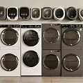 Various Modern Washing Machines in Different Styles White and Dark Colored Lined Up in Row