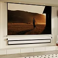 Large Screen TV Showing Person Walking In Sunset Field With Speakers And Living Room Decor