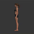 Woman in Black Sports Bra and Shorts Standing Against Grey Background
