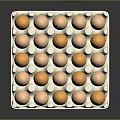 White Egg Carton With Light Pink And Orange Eggs Neatly Arranged On Dark Background