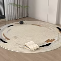 Round Area Rug Beige Black Brown Geometric Patterns With Open Book Vase On Wooden Floor