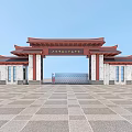Traditional Chinese Style School Building With Red Roof Archway Gate Stone Pillars And Stone-Paved Square