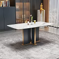 Modern White Marble Dining Table With Black And Gold Legs In Stylish Room