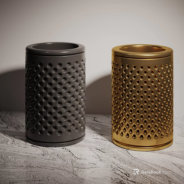 Elegant Decorative Ornament Set With Black And Gold Perforated Design On Marble Surface 3d model 