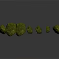 Decorative Green Stones in Various Sizes Arranged in a Curved Line