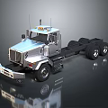 Silver Heavy Duty Truck With Flatbed Chassis Roof Warning Lights Reflective Surface And Multiple Wheels