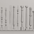 White Decorative Columns With Various Designs Arranged On Shelf With Light Gray Background 3d model