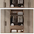 Organized Modern Wardrobe Interior With Hanging Clothes Folded Towels And Storage Boxes 3d model