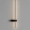 Modern Minimalist Wall Lamp With Metal Body On White Wall Soft Ambient Lighting