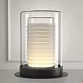 Modern Table Lamp With Transparent Glass Shade And White Ribbed Light Body And Black Base