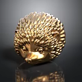 Golden Hedgehog Head Sculpture With Textured Spines And Reflective Surface