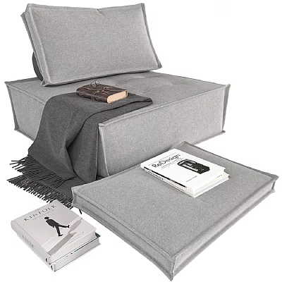 Gray Upholstered Single Sofa With Cozy Blanket And Stacked Books Design 3d model