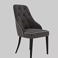 Gray Tufted Velvet Single Chair With Black Wooden Legs And Curved Backrest