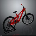 Red Frame Mountain Bike With Black Wheels Seat And Stand On Reflective Grey Background